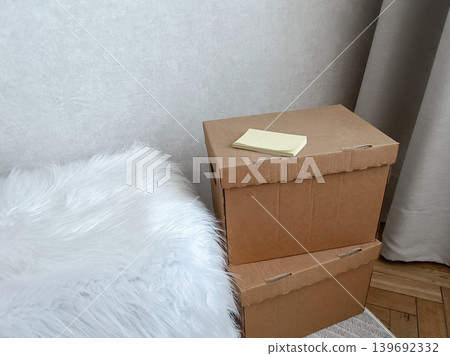 Stacked Cardboard Storage Boxes with Note Stacked Cardboard Storage Boxes with Note 139692332