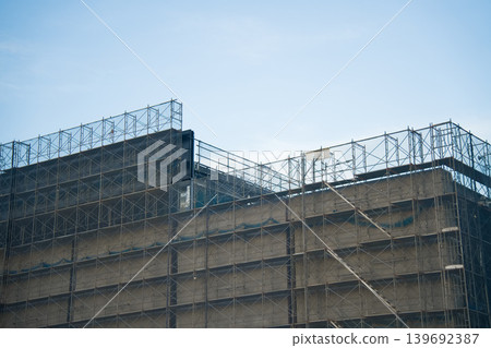 Building under construction and sky Building under construction and sky 139692387