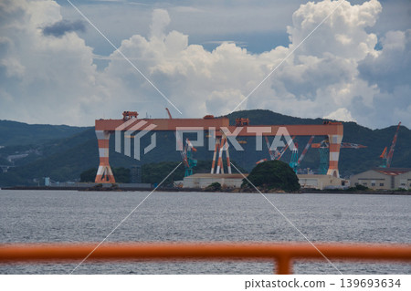 A giant Goliath crane at a shipyard in Nagasaki. A giant Goliath crane at a shipyard in Nagasaki. 139693634