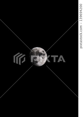 Detailed view of the moon in a vast, dark expanse of space. 139694200