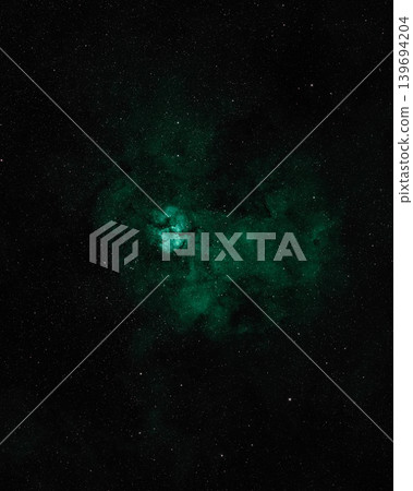 Intricate stellar glows with luminous green gas and dust among a field of twinkling stars. Telescope live. Intricate stellar glows with luminous green gas and dust among a field of twinkling stars. Telescope live. 139694204