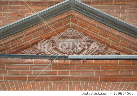 Decorative reliefs remaining in historical buildings Decorative reliefs remaining in historical buildings 139694503