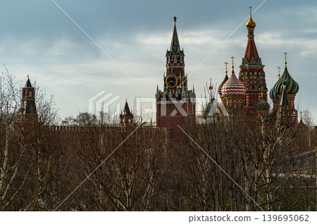 Moscow Kremlin and Saint Basil's Cathedral Behind Bare Trees on an Overcast Day Moscow Kremlin and Saint Basil's Cathedral Behind Bare Trees on an Overcast Day 139695062
