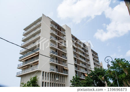 Pastel-colored buildings in Ajaccio, Napoleon's birthplace, on the French island of Corsica in the Mediterranean Sea. Pastel-colored buildings in Ajaccio, Napoleon's birthplace, on the French island of Corsica in the Mediterranean Sea. 139696873