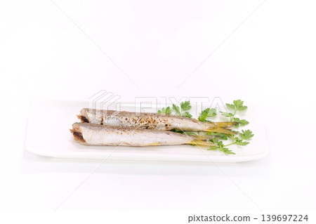 Salt-grilled barracuda (grilled fish) - bright background Salt-grilled barracuda (grilled fish) - bright background 139697224
