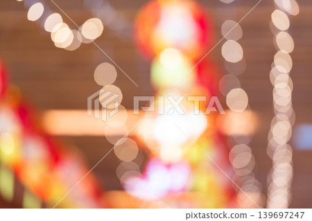 Red traditional Chinese lantern decorated at the wooden arch of the entrance to Lunar New Year festival. Red traditional Chinese lantern decorated at the wooden arch of the entrance to Lunar New Year festival. 139697247