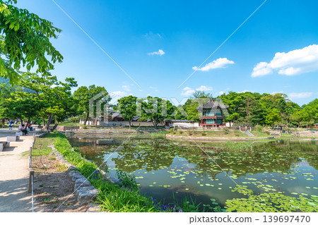 Seoul, South Korea - May. 14, 2026 : Beautiful view of Hyangwonjeong Pavilion and Chhyanggyo Bridge with pond reflection in early summer, Gyeongbokgung Palace, Seoul Seoul, South Korea - May. 14, 2026 : Beautiful view of Hyangwonjeong Pavilion and Chhyanggyo Bridge with pond reflection in early summer, Gyeongbokgung Palace, Seoul 139697470