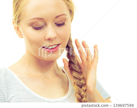 Blonde girl with braid hair Blonde girl with braid hair 139697599