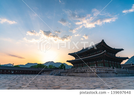 Seoul, South Korea - May. 14, 2026 : Majestic Geunjeongjeon Hall in Gyeongbokgung Palace illuminated by the golden hour sunset light, Seoul, South Korea Seoul, South Korea - May. 14, 2026 : Majestic Geunjeongjeon Hall in Gyeongbokgung Palace illuminated by the golden hour sunset light, Seoul, South Korea 139697648