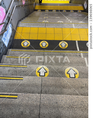Stairs where you must walk on the left 139698065