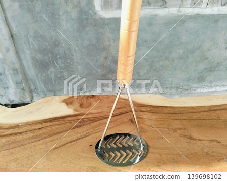 Stainless Steel Potato Masher with Wooden Handle Stainless Steel Potato Masher with Wooden Handle 139698102