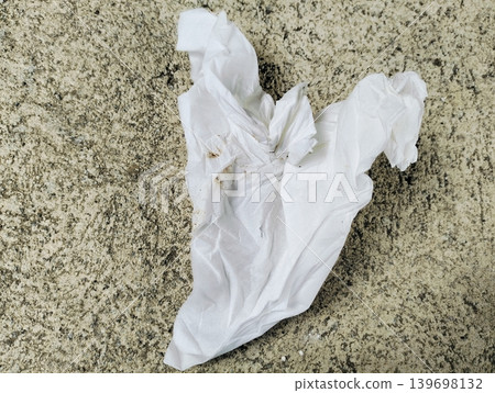 Crumpled and dirty used tissue paper on wooden table 139698132