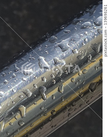 Water droplets on metal surface. Water droplets on metal surface. 139698261