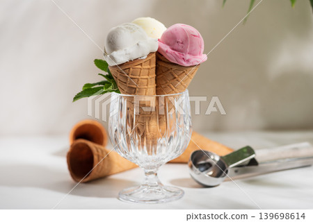Ice Cream Cones with Strawberries and Mint on White Background Ice Cream Cones with Strawberries and Mint on White Background 139698614
