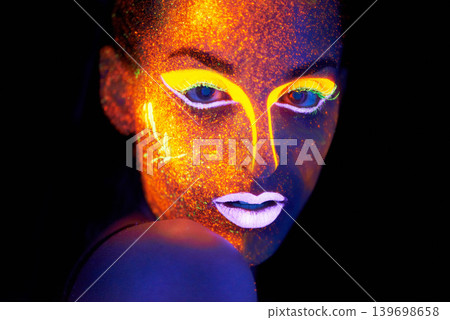 Portrait, beauty and fantasy with neon woman on black background for makeup, glitter or colorful glow. Face, art and creative with confident young person in the dark for psychedelic or techno paint 139698658