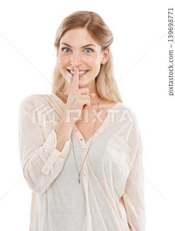 Secret, excited or portrait of happy woman with finger on lips in studio, white background for privacy. Mouth, smile or shush for quiet silence, gossip and whisper sign for confidential mystery news Secret, excited or portrait of happy woman with finger on lips in studio, white background for privacy. Mouth, smile or shush for quiet silence, gossip and whisper sign for confidential mystery news 139698771