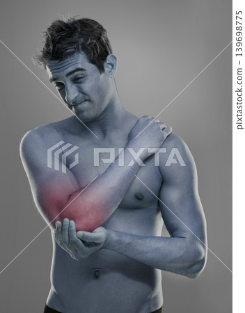 Joint pain, arm injury and man with elbow problem, medical emergency and massage tendinitis. Red glow, osteoporosis and studio person with inflammation, accident or hurt anatomy on grey background Joint pain, arm injury and man with elbow problem, medical emergency and massage tendinitis. Red glow, osteoporosis and studio person with inflammation, accident or hurt anatomy on grey background 139698775