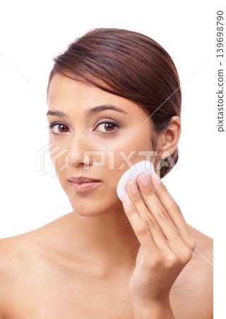Woman, cotton pad and beauty with portrait, face and model for skincare, cosmetics on white background. Makeup, beautiful and headshot with shine, apply or clean for glow, dermatology or toner Woman, cotton pad and beauty with portrait, face and model for skincare, cosmetics on white background. Makeup, beautiful and headshot with shine, apply or clean for glow, dermatology or toner 139698790