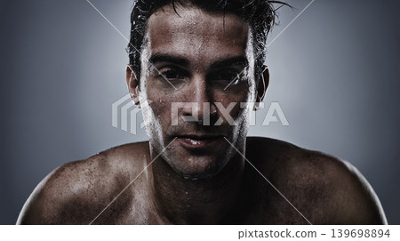 Portrait, man and water with cosmetics, sweating and dermatology on grey studio background. Face, person and model with hydration and beauty with morning routine, wet and hygiene with skincare Portrait, man and water with cosmetics, sweating and dermatology on grey studio background. Face, person and model with hydration and beauty with morning routine, wet and hygiene with skincare 139698894