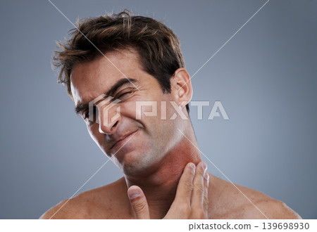 Man, shave and beard rash from razor burn on grey background for skin care fail, itchy or hair removal. Male person, neck and red pain for healthy wellness or inflammation, studio or mockup space Man, shave and beard rash from razor burn on grey background for skin care fail, itchy or hair removal. Male person, neck and red pain for healthy wellness or inflammation, studio or mockup space 139698930