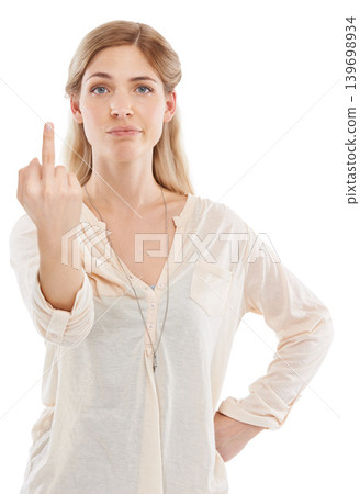Angry, portrait or woman with middle finger in studio for attitude, feedback or opinion on white background. Frustrated, rude or lady model face with hate, hand or emoji, sign or reaction to conflict 139698934