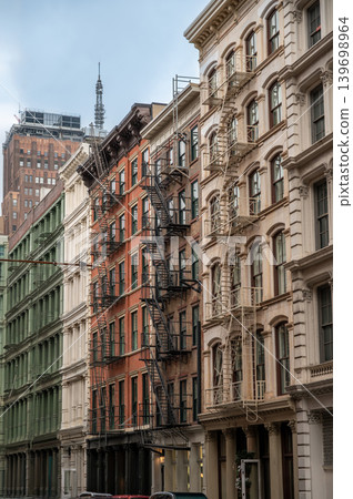 New york, usa august 18,2024. New york city historic cast iron buildings in soho showing classic architecture and metal fire escapes. Urban cityscape scene New york, usa august 18,2024. New york city historic cast iron buildings in soho showing classic architecture and metal fire escapes. Urban cityscape scene 139698964