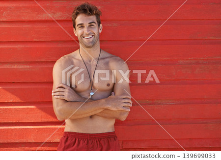 Happy man, portrait and professional lifeguard in confidence at beach with whistle for security, bay watch or surveillance. Male person, athlete or swimmer standing guard with smile on mockup space 139699033