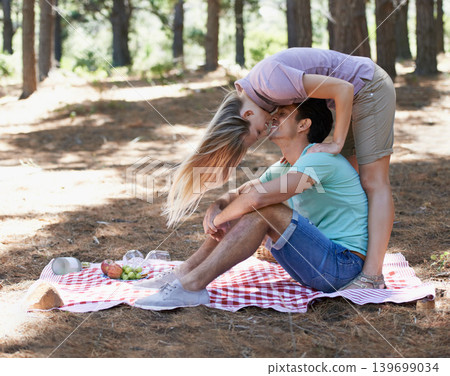 Happy couple, hug and relax in nature for picnic, love or support in affection, date or outdoor bonding. Young woman and man sitting on floor with smile for embrace, comfort or romance in forest Happy couple, hug and relax in nature for picnic, love or support in affection, date or outdoor bonding. Young woman and man sitting on floor with smile for embrace, comfort or romance in forest 139699034