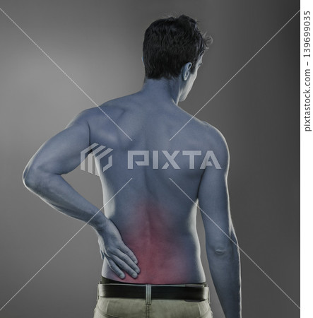 Man, back pain and injury of fitness in studio, medical problem and muscle tension or sore of training. Model, joint ache or spine with inflammation of sport accident or arthritis by grey background 139699035