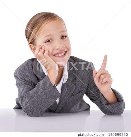 Child, portrait and business career in suit for future professional dreams, white background or studio. Kid, girl and finger for grownup idea as worker in corporate company, dress up or mockup space 139699230