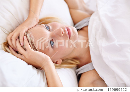 Stress, anxiety and woman in a bed with insomnia, overthinking or fear in her home. Sleeping fail, frustrated and face of female person in a bedroom with mental health crisis, panic attack or worried Stress, anxiety and woman in a bed with insomnia, overthinking or fear in her home. Sleeping fail, frustrated and face of female person in a bedroom with mental health crisis, panic attack or worried 139699322