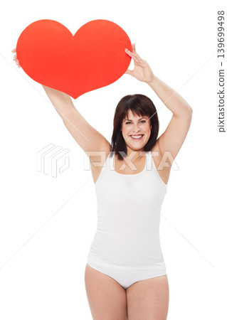 Portrait, heart and happy plus size woman in studio isolated on a white background. Love, sign or symbol of model in underwear with healthy body for care, kindness emoji and romance on valentines day Portrait, heart and happy plus size woman in studio isolated on a white background. Love, sign or symbol of model in underwear with healthy body for care, kindness emoji and romance on valentines day 139699498