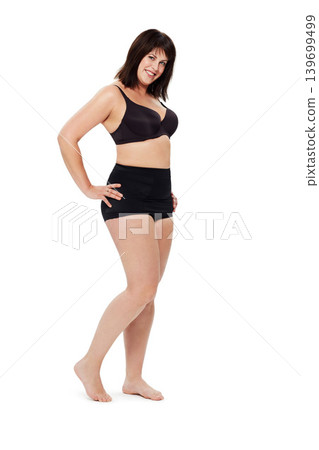 Portrait, smile and confident plus size woman in underwear in studio isolated on a white background mockup space. Happy person, model and body positivity, health and natural beauty of young girl Portrait, smile and confident plus size woman in underwear in studio isolated on a white background mockup space. Happy person, model and body positivity, health and natural beauty of young girl 139699499