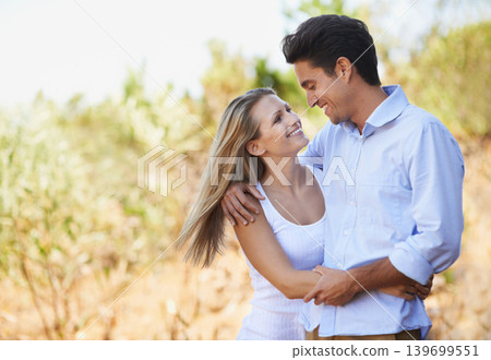 Happy couple, hug and embrace in nature for bonding, love support for outdoor affection or comfort. Face of young woman and man hugging for embrace or peaceful romance in forest or woods together Happy couple, hug and embrace in nature for bonding, love support for outdoor affection or comfort. Face of young woman and man hugging for embrace or peaceful romance in forest or woods together 139699551