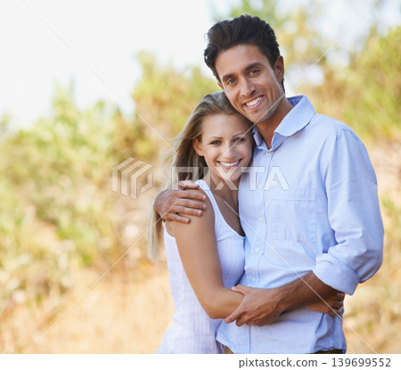 Happy couple, portrait and hug in nature for embrace, bonding or love in support or outdoor affection. Face of young woman and man smile for comfort, trust or romance in forest or woods together Happy couple, portrait and hug in nature for embrace, bonding or love in support or outdoor affection. Face of young woman and man smile for comfort, trust or romance in forest or woods together 139699552