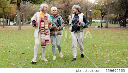 Senior friends, walking and talking with yoga mats in the park to relax in nature with elderly women in retirement. People, happy conversation and healthy outdoor exercise or pilates in winter Senior friends, walking and talking with yoga mats in the park to relax in nature with elderly women in retirement. People, happy conversation and healthy outdoor exercise or pilates in winter 139699563