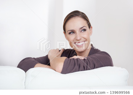 Face, thinking and woman in house, couch for memories, smile and wellbeing. Happiness, calm and weekend with female person, home and joy, carefree and comfortable alone in sofa to relax 139699566