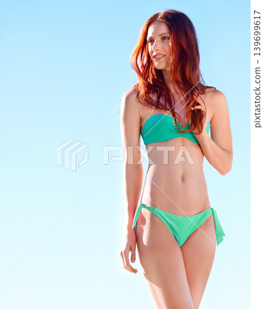 Smile, bikini and redhead woman outdoor for vacation, holiday or summer travel on trip by blue sky mockup space. Ginger, happy and young person in swimsuit, girl thinking of beauty or body health Smile, bikini and redhead woman outdoor for vacation, holiday or summer travel on trip by blue sky mockup space. Ginger, happy and young person in swimsuit, girl thinking of beauty or body health 139699617