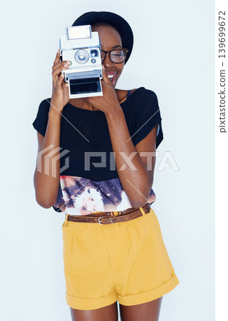 Woman, photographer and happy in studio with vintage camera, creativity and media for artist with creative talent. African person, positive and retro film for photoshoot and focus by white background Woman, photographer and happy in studio with vintage camera, creativity and media for artist with creative talent. African person, positive and retro film for photoshoot and focus by white background 139699672