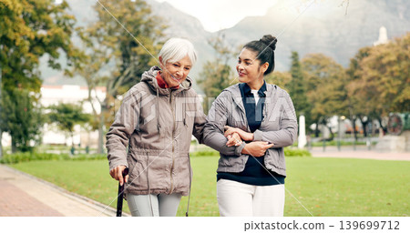 Senior woman, walker and nurse outdoor in a park with healthcare for elderly exercise. Walking, healthcare professional and female person with peace and physical therapy in a public garden with carer Senior woman, walker and nurse outdoor in a park with healthcare for elderly exercise. Walking, healthcare professional and female person with peace and physical therapy in a public garden with carer 139699712