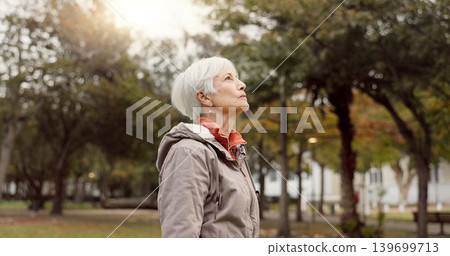 Freedom, nature and elderly woman breathing on vacation, holiday journey and winter travel. Park, fresh air and senior person outdoor for peace, calm and celebration for health, wellness and relax. Freedom, nature and elderly woman breathing on vacation, holiday journey and winter travel. Park, fresh air and senior person outdoor for peace, calm and celebration for health, wellness and relax. 139699713