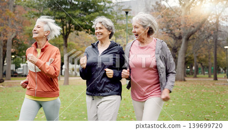 Senior women, walking and friends with fitness, wellness and workout for health in retirement. Park, exercise and elderly female group with motivation and power walk for cardio outdoor together Senior women, walking and friends with fitness, wellness and workout for health in retirement. Park, exercise and elderly female group with motivation and power walk for cardio outdoor together 139699720