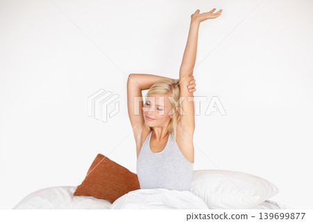 Woman, morning and stretching in bed for wake up routine in home or weekend relax for comfort, rest or lazy. Female person, mockup space and linen bedding in apartment for peace, tired or wellness Woman, morning and stretching in bed for wake up routine in home or weekend relax for comfort, rest or lazy. Female person, mockup space and linen bedding in apartment for peace, tired or wellness 139699877