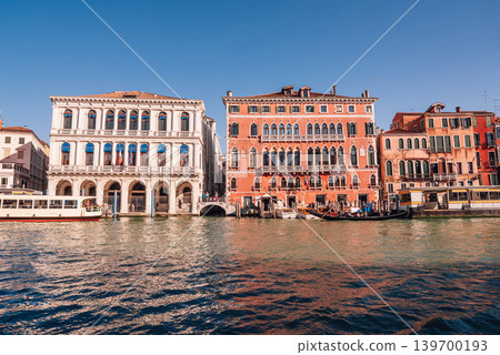 Classic Venice Grand canal houses viewed from vaporetto boat - waterbus. Italy. Classic Venice Grand canal houses viewed from vaporetto boat - waterbus. Italy. 139700193
