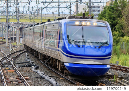 The HOT7000 series Super Hakuto limited express train running on the JR Kyoto Line The HOT7000 series Super Hakuto limited express train running on the JR Kyoto Line 139700249
