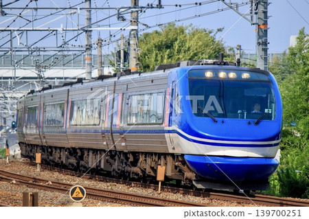 The HOT7000 series Super Hakuto limited express train running on the JR Kyoto Line The HOT7000 series Super Hakuto limited express train running on the JR Kyoto Line 139700251