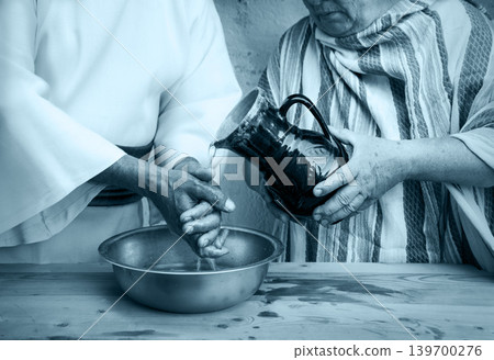 Woman pour water on hands Woman pour water on hands 139700276