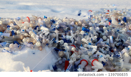 Used Blood Transfusion Scattered On A Snow 139700835