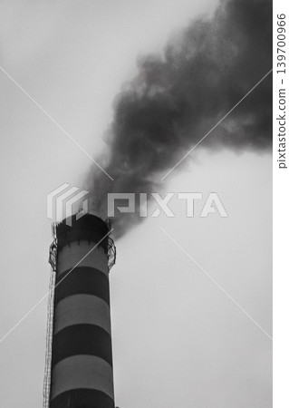 Pollution of the environment, air and ecology are global problems. Toxic smoke from the dirty chimney of an industrial plant is released into the atmosphere Pollution of the environment, air and ecology are global problems. Toxic smoke from the dirty chimney of an industrial plant is released into the atmosphere 139700966