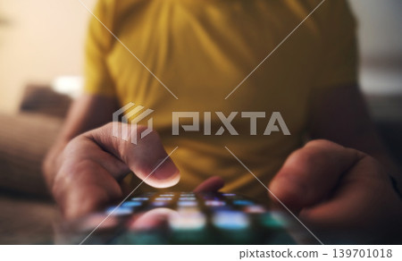 Man Scrolling To Find An Application On Smartphone Screen At Home, Vertical Video 139701018